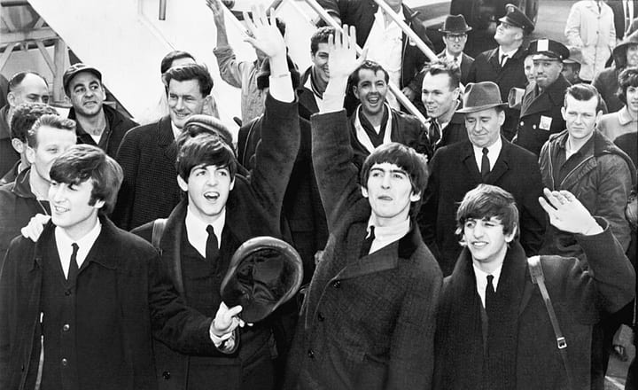 The Beatles, who came apart on camera during the Let It Be sessions.