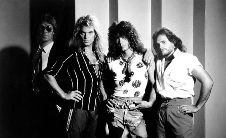 Van Halen performing live, the band that splintered after 1984.